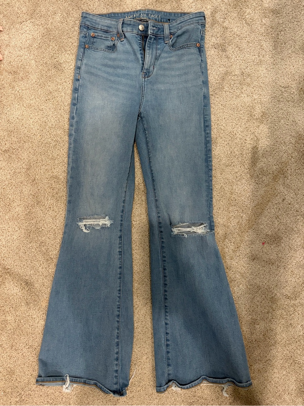 American Eagle Outfitters Light Blue Flare Jeans with Knee Rips